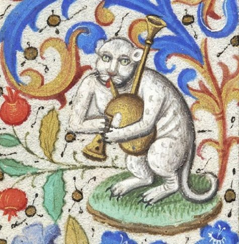 Medieval cat in illuminated script.jpg
